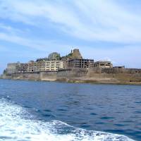 \"Battleship Island\": Nagasaki Prefecture\'s uninhabited Hashima Island, which was a thriving coal mining facility from the late 19th century to the mid-1970s, was picked Tuesday by a government panel for possible inclusion on the UNESCO World Heritage list in 2015. | KYODO