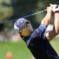 Ryo Ishikawa tees off at the Oak Hill Country Club, Rochester, N.Y., during round 3 of the PGA Championship. | KYODO