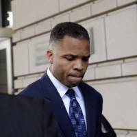 Guilty: Former Illinois Rep. Jesse Jackson Jr. leaves federal court in Washington on Wednesday. | AP