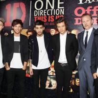 Nothing new here: Members of pop group One Direction and director Morgan Spurlock (second from right) at the New York premiere of “This is Us” on Aug. 26. One Direction's new movie is a sign of the times