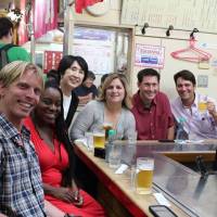 People-to-people exchanges: Mutsumi Katayama (third from left) has annually organized and attended the Japan tours offered for American teachers selected as California Teachers of the Year (CTOY). The CTOY 2013 teachers enjoy “okonomiyaki” (Japanese savory pancake) at Okonomimura in Hiroshima on June 29, during their tour of Japan.  | COURTESY OF MUTSUMI KATAYAMA