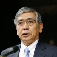 Talking it up: Bank of Japan Gov. Haruhiko Kuroda speaks in Tokyo on Friday.   | KYODO