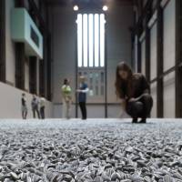 While Ai Weiwei\'s \"Sunflower Seeds,\" an installation comprising millions of handcrafted porcelain seeds, is the latest. | BLOOMBERG