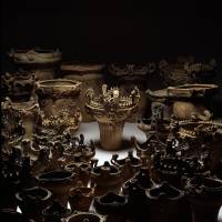 Otherworldly gathering: A wondrous trove of Jomon pots from the Sasayama site in Niigata Prefecture that Ogawa has arranged and lit so \"people sit up and take notice.\" | TADAHIRO OGAWA