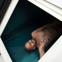 Taking the plunge: Journalist Justin Moyer gets ready for an hour of floating in a sensory-deprivation tank. This therapy is said to help people manage pain, battle depression and quit smoking. A recipe for sanity: water, salt and nothing else