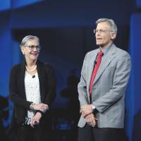 All in the family: Alice Walton and Jim Walton, chairman and chief executive officer of Arvest Bank Group Inc., smile during the Wal-Mart Stores Inc. annual shareholders meeting in Fayetteville, Arkansas. The Waltons, America’s richest family, exploit a variety of legal loopholes to avoid the estate tax, according to court records and Internal Revenue Service filings. How Wal-Mart's Waltons maintain their billionaire fortune