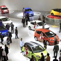 Going green: Environment-friendly vehicles are shown at the Indonesia motor show in Jakarta on Thursday. Makers show low-cost green vehicles in Jakarta