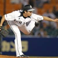 Getting the job done: Marines southpaw Takuya Furuya holds the Lions to two runs in seven innings on Monday at QVC Marine Stadium. Chiba Lotte defeated Seibu 4-3. | KYODO