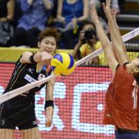 Good positioning: Japan\'s Saori Kimura taps the ball over the net against Vietnam during the Asian qualifying round for the FIVB World Championships on Thursday in Komaki, Aichi Prefecture. Japan defeated Vietnam 25-9, 25-16, 25-20. | KYODO