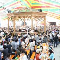 Roll out the barrel: A previous Oktoberfest celebration in Yokohama brings out plenty of beer lovers. This year, Germany\'s Woho Kalandar Band will soundtrack the party. | ACHIM RUNNEBAUM