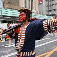 Dressing up history: A participant parades in the Tokyo Jidai (Historical) festival. | ASAKUSA KANKORENMEI