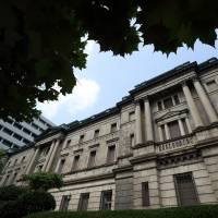 Staying tuned: A Bank of Japan policymaker stressed the importance of adjusting monetary policy without hesitation if the economy deteriorates, according to the minutes of last month\'s meeting. | BLOOMBERG