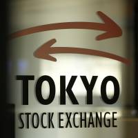 On the upswing: Japan Exchange Group Inc., operator of the Tokyo Stock Exchange and Osaka Stock Exchange, beat its first-half profit forecast as the biggest share rally in four decades boosted trading volumes. | BLOOMBERG