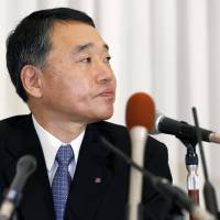Checking out: Hankyu Hanshin Hotels Co. President Hiroshi Desaki faces the media on Monday in Osaka after announcing he will step down over a false advertising scandal involving restaurant food. | KYODO