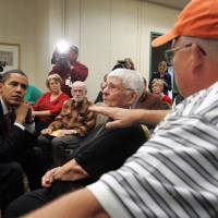 The nuclear waste state: In Naperville, Illinois, in December 2006, Sen. Barack Obama listens to a group of workers from two Illinois nuclear plants who say they were affected by nuclear waste. Obama later gave testimony to the Federal Advisory Board on Radiation and Worker Health | BLOOMBERG