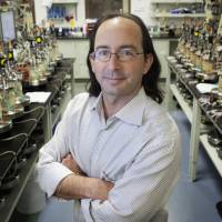 Miracle worker: Jack Newman, chief science officer at biotech firm Amyris, which creates more than 1,500 new organisms daily, stands in a yeast fermentation lab in Emeryville, California, on Wednesday Scientists now creating 'app-style' life-forms