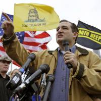 Cruz control: Texas Republican Sen. Ted Cruz speaks at a rally in front of the WWII Memorial in Washington on Oct. 13. Cruz took nothing short of a victory lap in his state of Texas last week, appearing before crowds that overlooked the fact that the Republican who led the charge to kill money for President Barack Obama\'s health care law had failed. Over the weekend, Cruz visited Iowa, where Republicans have the first say in the presidential race, and viewed him much more skeptically | AP