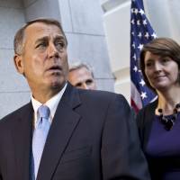 Eleventh hour brainstorming: Speaker of the House John Boehner speaks to reporters after a Republican strategy session in the U.S. Capitol in Washington on Tuesday. | AP