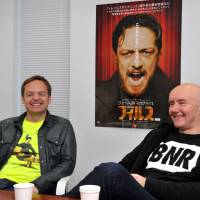 Left: Director Jon S. Baird (left) and author Irvine Welsh on a promotional visit to Tokyo this week. | YOSHIAKI MIURA