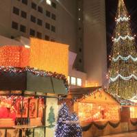 Market festivities: Osaka\'s German Christmas Market sports a 27-meter-tall tree. | ROBBIE SWINNERTON