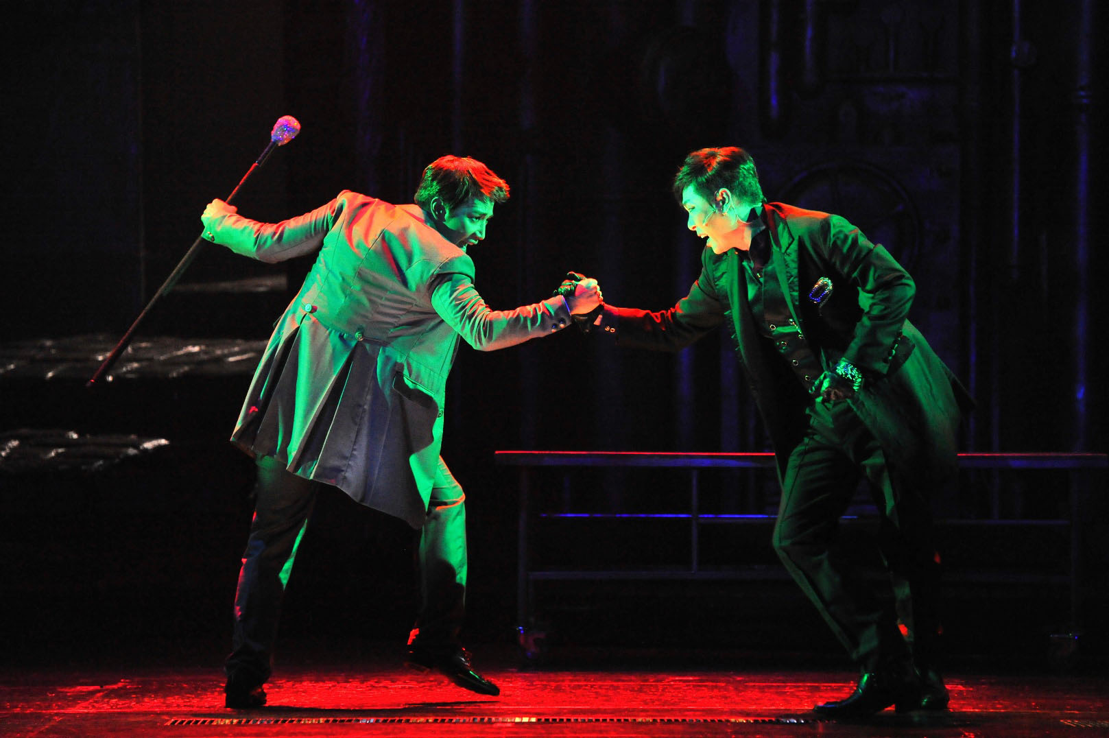 Gotcha: Deep-voiced Kim Beumrae (on the right) shows off some prowess in his title role in 'Jack the Ripper,' a hugely successful Korean musical whose almost entirely female audiences adore the male cast members and invariably end up screaming with glee as the performance draws to a close.  | &#169; AKIHITO ABE