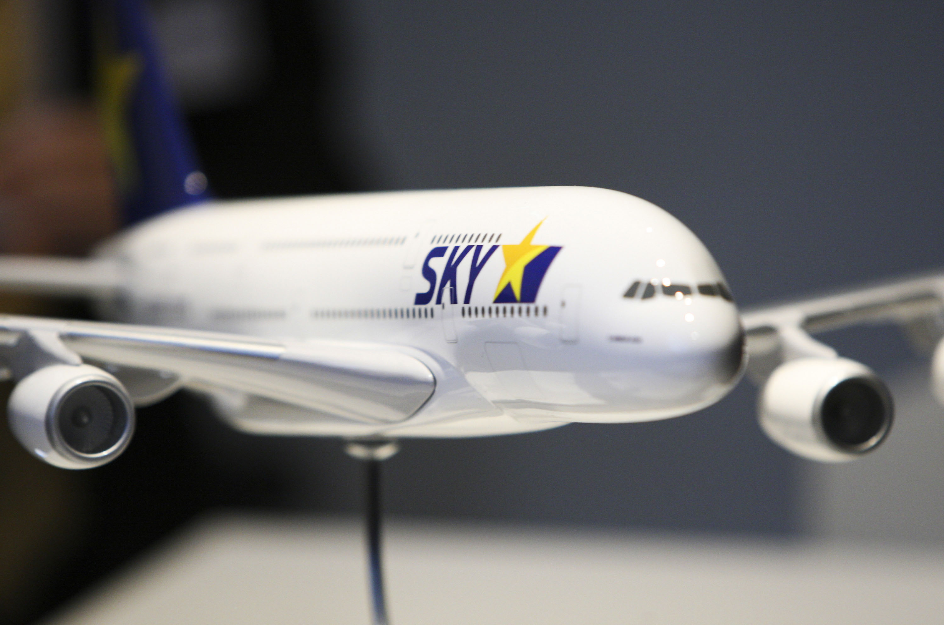 A matter of financing: A model of a Skymark Airlines Inc. Airbus A380 sits on display during a news conference at the Paris Air Show in June 2011. | BLOOMBERG