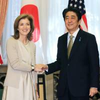 Courtesy call: U.S. Ambassador to Japan Caroline Kennedy meets Prime Minister Shinzo Abe at his residence Wednesday. | POOL