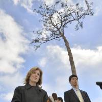 Legacy  of 3/11: U.S. Ambassador to Japan Caroline Kennedy faces reporters Tuesday next to the \"miracle pine\" that withstood the tsunami in Rikuzentakata, Iwate Prefecture. | KYODO