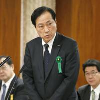 Mizuho Bank President Yasuhiro Sato is seen attending the Committee on Financial Affairs of the Upper House as an unsworn witness on Thursday. | KYODO