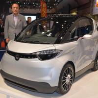 Motiv-ating: Yamaha Motor Co. President Hiroyuki Yanagi presents the Motiv prototype at the Tokyo Motor Show on Wednesday. | AFP-JIJI