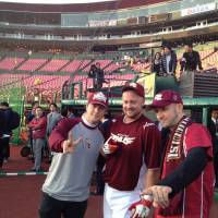 A sense of community: Monkey Majik members Blaise Plant (left) and brother Maynard Plant (right), joined by third baseman casey McGehee, are long-time supporters of the Tohoku Rakuten Golden Eagles. Rock band Monkey Majik provides positive vibes for Tohoku, enjoys passionate following for Golden Eagles
