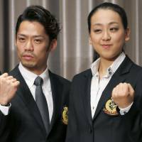 Go for gold: Mao Asada and Daisuke Takahashi pose during a news conference on Thursday. | KYODO