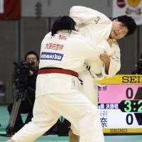 Teenage kicks: Sara Asahina (right) competes in the over-78-kg class at the Kodokan Cup at Chiba Port Arena on Saturday. Asahina won the competition. | KYODO
