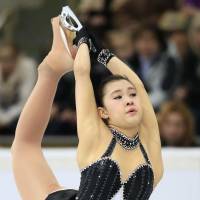 Rough start: Kanako Murakami skates in the women\'s short program on Friday at the Cup of Russia in Moscow. Murakami is in last place in the nine-woman field with 49.24 points. | KYODO