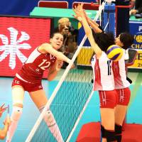 Attack mode: Russia\'s Alexandra Pasynkova spikes the ball against Japan during Tuesday\'s match in Nagoya | FIVB