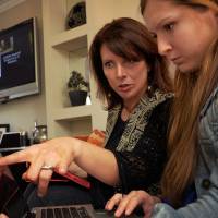Think empowerment: Kathy Korman Frey (left) and Hannah Friedman talk at a gathering to watch the Hot Mammas Project awards Saturday in Washington. | THE WASHINGTON POST