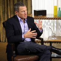 Come clean: Lance Armstrong talks to Oprah Winfrey during an interview where the disgraced cyclist gave into years of allegations and admitted that he used performance-enhancing drugs during each of his seven Tour de France wins. | AFP-JIJI