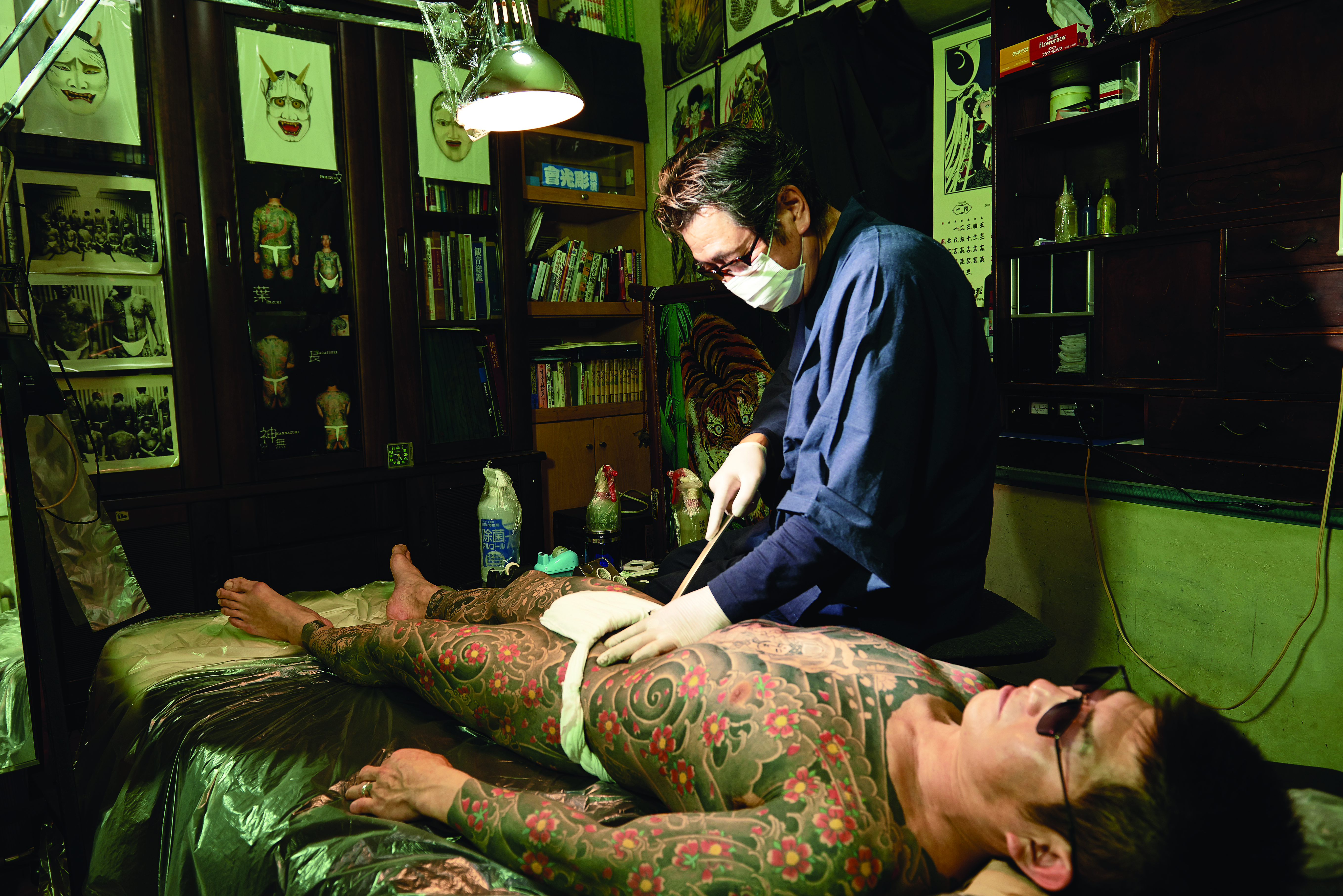 Pain and ink: Horimitsu in his studio at work on a full-body tattoo. | IRWIN WONG