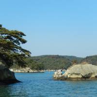 Nature\'s front line: Little pine-clad islands like these dotting Matsushima Bay in Miyagi Prefecture are picturesque, and effective, barriers protecting human settlements from stormy seas and Japan\'s inevitable tsunami. | STEPHEN HESSE PHOTO