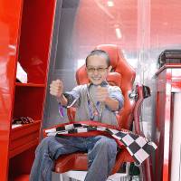 Boy racer: Seventeen-year-old Mostafa Horie spent some time in the Ferrari camp at the Suzuka racing circuit, Mie Prefecture, in October. | COURTESY OF THE HORIE FAMILY