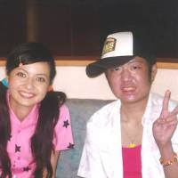 Positive vibes: Yuta Suzuki poses for a photo with TV star Becky during a visit to a TV studio in Tokyo in 2006 that was organized by Make-a-Wish of Japan. | COURTESY OF YUTA SUZUKI
