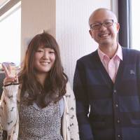 Survivor: Yuta Suzuki poses for a photo with Yura Tsutsumi, 10 years after he was first diagnosed with leukemia. | JUN HONGO