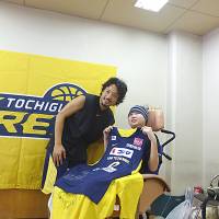 From top: Basketball star Yuta Tabuse grants a fan\'s wish at a practice sessions; a boy poses for a photo with a conductor after taking a tour of the Doctor Yellow high-speed test train; a \"One Piece\" fan is all smiles after receiving toys and a trademark hat. | COURTESY OF MAKE-A-WISH OF JAPAN