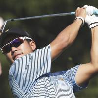 Hideki Matsuyama  tees off during a practice round for the Presidents Cup at Muirfield Village in October.  | AP