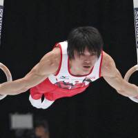 Lord of the rings: Kohei Uchimura performs on the rings during the all-around final at the world gymnastics championships in Antwerp, Belgium, in October.   | AP