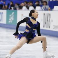 Time to give it up: Mao Asada can no longer rely on the triple axel to score big points in competition. She should eliminate the jump from her programs and concentrate on other elements.  | KYODO 