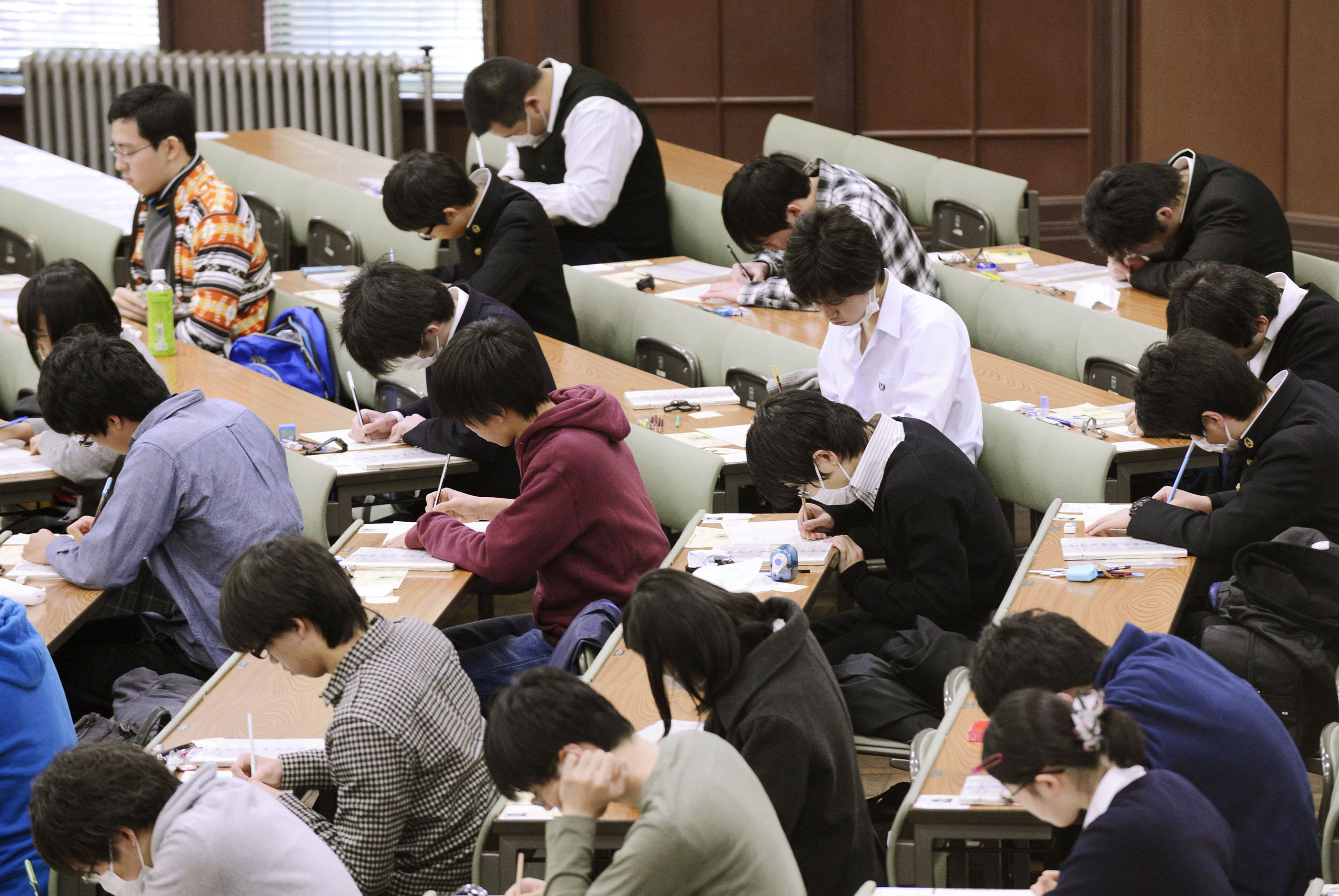 By the book: Applicants take the 'center' standardized exam at the University of Tokyo's Hongo campus in January. | KYODO