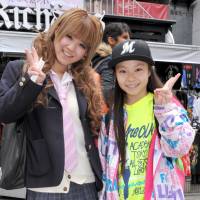 Fashion statement: High school student Yuna Kobayashi, 18, (left) poses with her sister, Yuzuha, 12, who is wearing dancer-fashion clothes. | YOSHIAKI MIURA