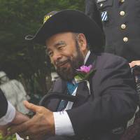 Hispanic hero: Rodolfo \"Rudy\" Hernandez is greeted by friends at an event commemorating the 60th anniversary of the end of the Korean War in Washington in July. | THE WASHINGTON POST