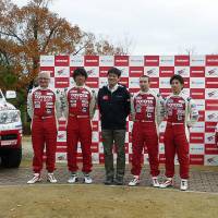 Race ready: Members of the Toyota team taking part in the 2014 Dakar Rally face the media Wednesday in Toyota, Aichi Prefecture. | KYODO
